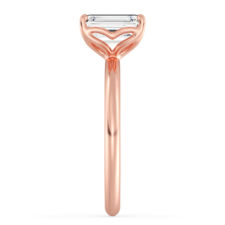 Classic emerald-cut solitaire engagement ring with a 4-claw lab-grown diamond in 18K rose gold, offering a romantic and modern touch