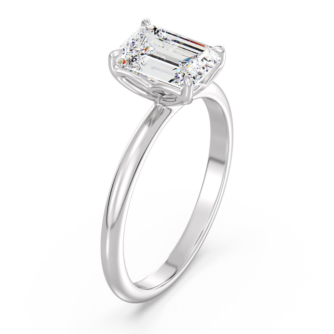 Classic emerald-cut solitaire engagement ring with a 4-claw lab-grown diamond in 18K white gold, exuding sophistication and brilliance