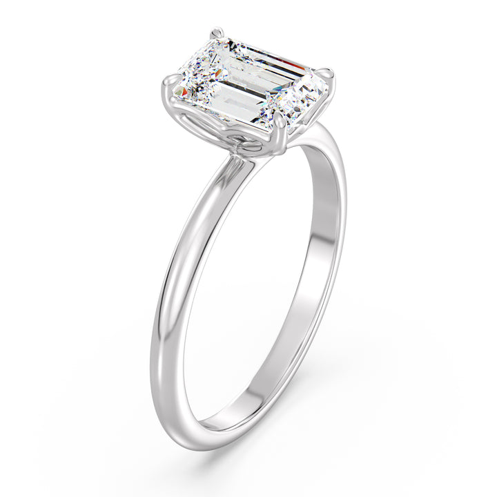 Classic emerald-cut solitaire engagement ring with a 4-claw lab-grown diamond in 18K white gold, exuding sophistication and brilliance