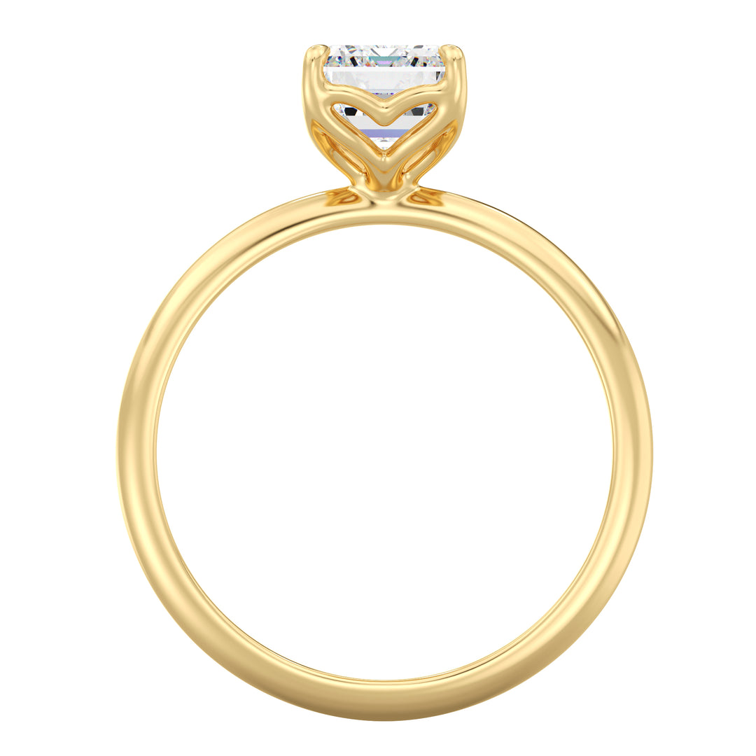 Classic emerald-cut solitaire engagement ring with a 4-claw lab-grown diamond in 18K yellow gold, showcasing timeless elegance and brilliance