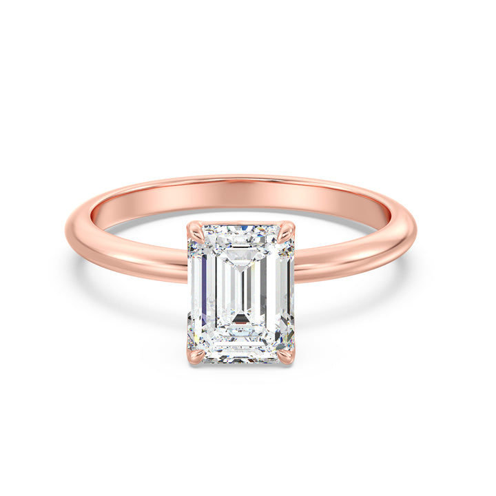 Classic emerald-cut solitaire engagement ring with a 4-claw lab-grown diamond in 18K rose gold, offering a romantic and modern touch