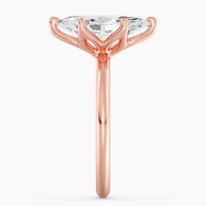 Classic 6-Claw Marquise-Cut Lab-Grown Diamond Solitaire Ring in 18K Rose Gold – Timeless beauty featuring a marquise-cut lab-grown diamond, offered in various carat weights