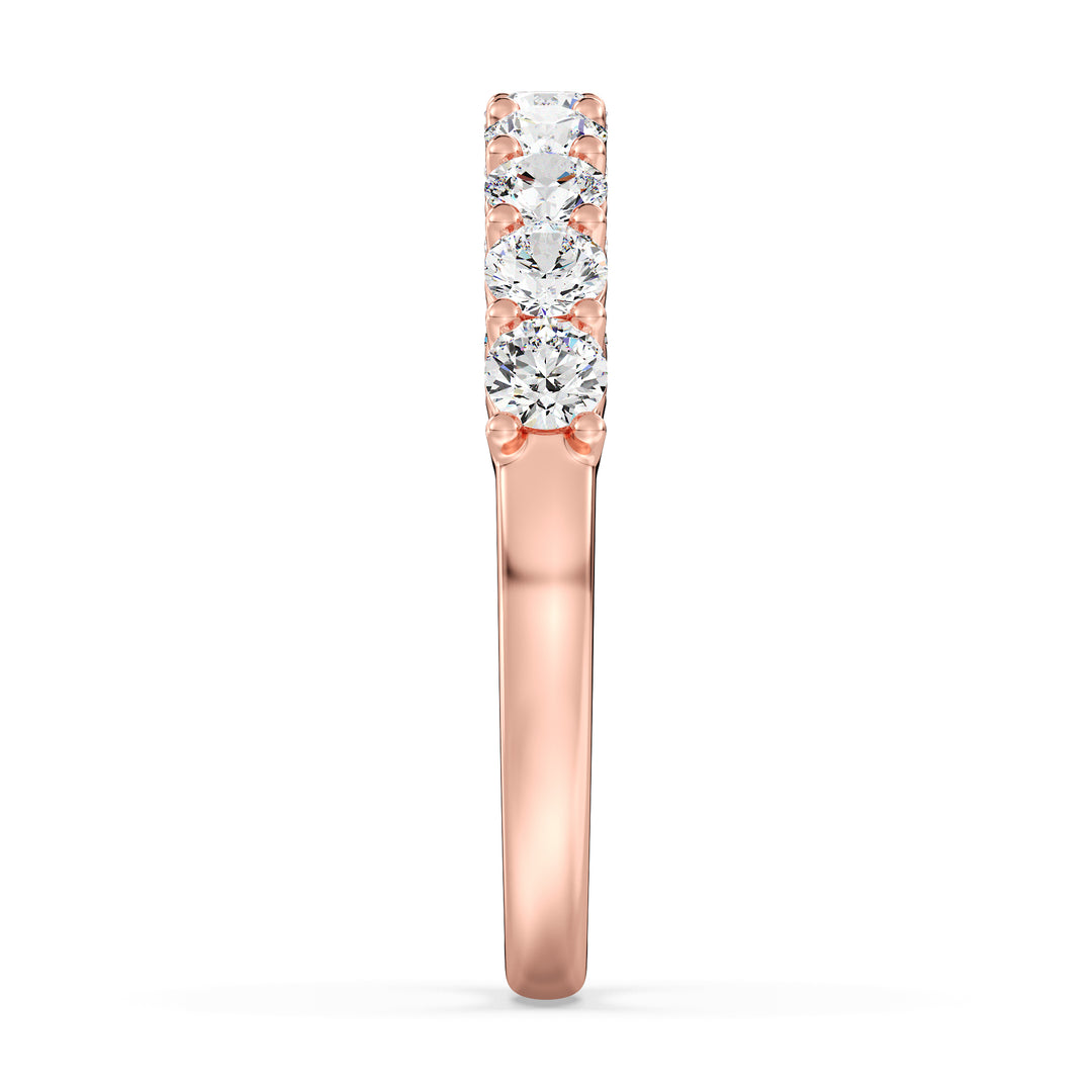 Exquisite nine-stone round lab-grown diamond wedding ring in 18K rose gold, adorned with brilliant EF/VS diamonds for a romantic touch.