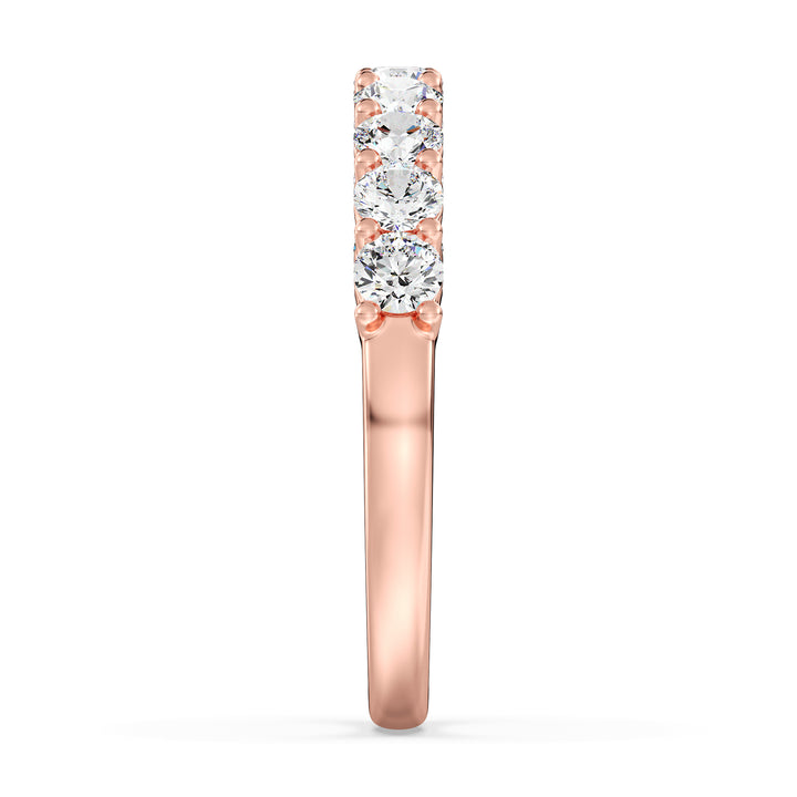 Exquisite nine-stone round lab-grown diamond wedding ring in 18K rose gold, adorned with brilliant EF/VS diamonds for a romantic touch.