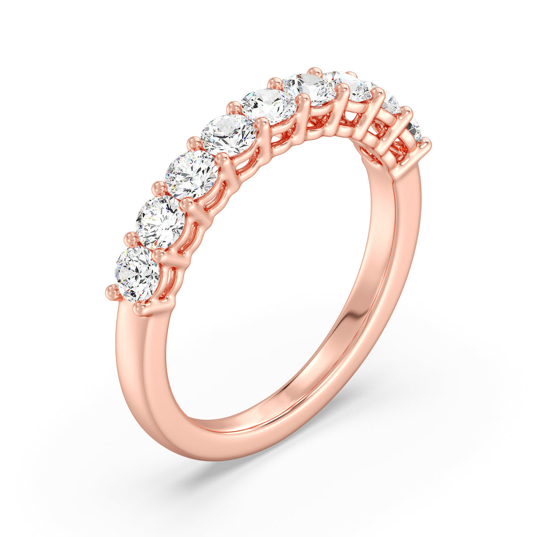 Exquisite nine-stone round lab-grown diamond wedding ring in 18K rose gold, adorned with brilliant EF/VS diamonds for a romantic touch.