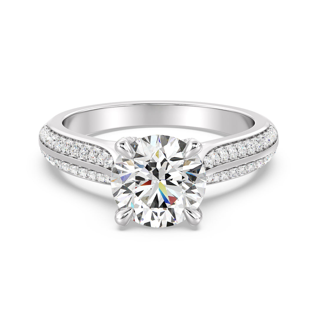 Round-Cut Lab-Grown Diamond Engagement Ring with Pavé Band in 18K White Gold, highlighted by a brilliant center diamond and 74 pavé-set side stones.