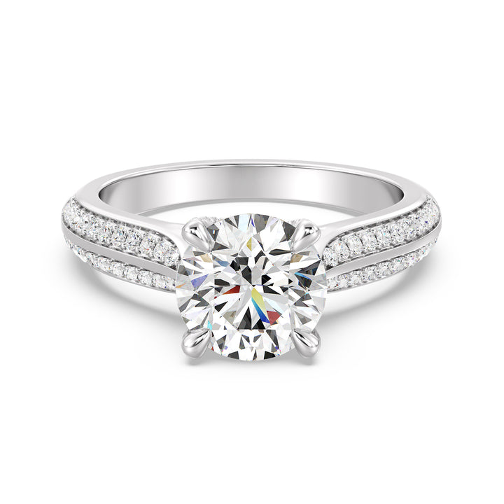 Round-Cut Lab-Grown Diamond Engagement Ring with Pavé Band in 18K White Gold, highlighted by a brilliant center diamond and 74 pavé-set side stones.