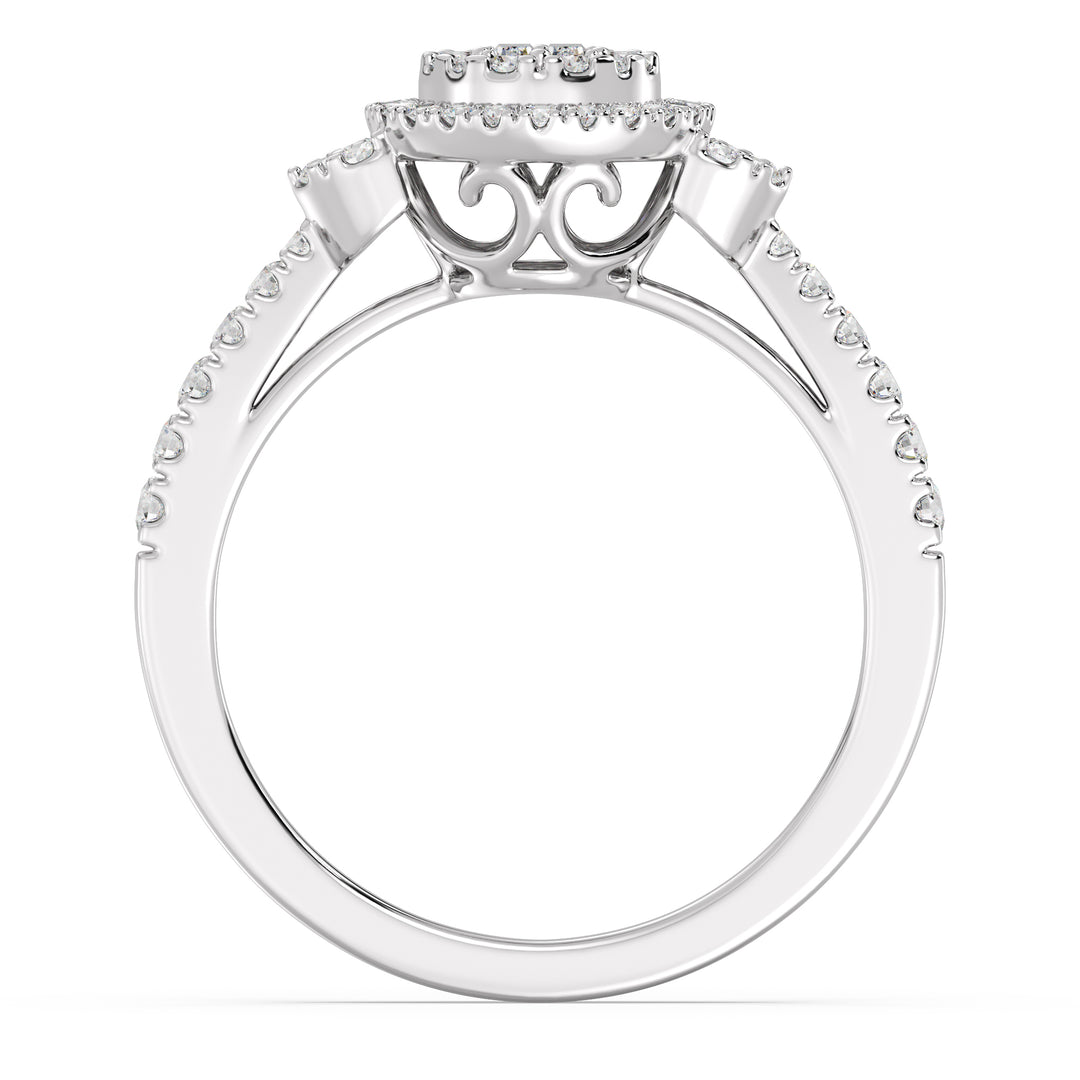 Round Cluster Halo Engagement Ring in 18K white gold featuring 0.54 CTTW lab-grown diamonds with round and baguette shapes, exuding a modern and sophisticated charm.