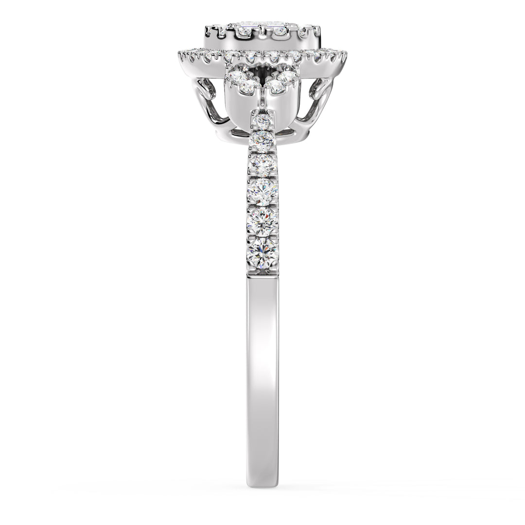 Round Cluster Halo Engagement Ring in 18K white gold featuring 0.54 CTTW lab-grown diamonds with round and baguette shapes, exuding a modern and sophisticated charm.