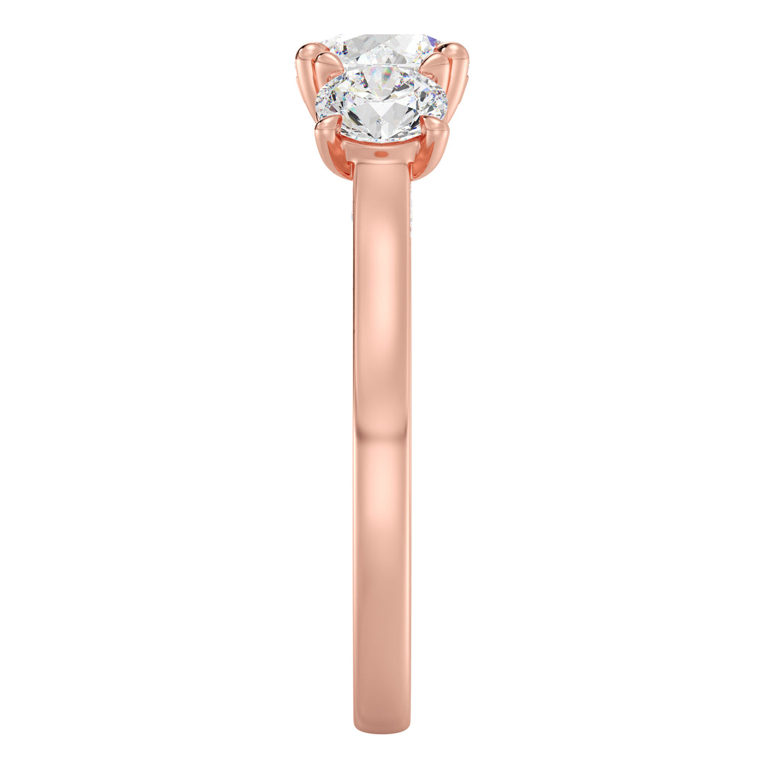 Three-Stone Round-Cut Lab-Grown Diamond Engagement Ring in 18K Rose Gold with Claw Prong Setting, showcasing a 1-carat center diamond and 0.50-carat side diamonds.
