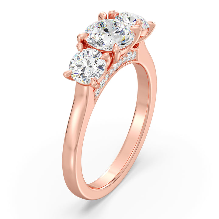 Three-Stone Round-Cut Lab-Grown Diamond Engagement Ring in 18K Rose Gold with Claw Prong Setting, showcasing a 1-carat center diamond and 0.50-carat side diamonds.