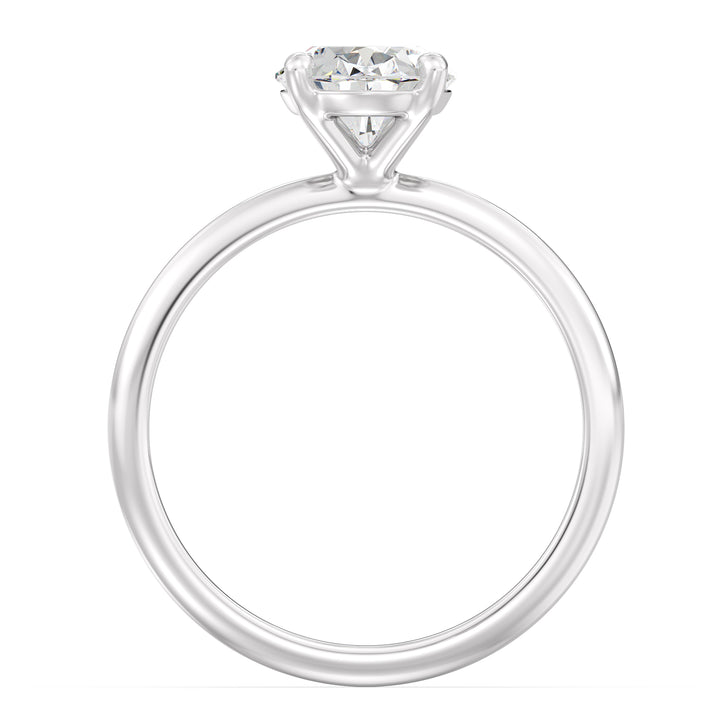 Timeless 4-Claw Oval Lab-Grown Diamond Solitaire Engagement Ring in 18K White Gold, highlighting a sleek and timeless design with a sparkling oval-cut diamond.