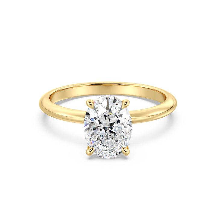 Timeless 4-Claw Oval Lab-Grown Diamond Solitaire Engagement Ring in 18K Yellow Gold, featuring a radiant oval-cut diamond with exceptional brilliance.