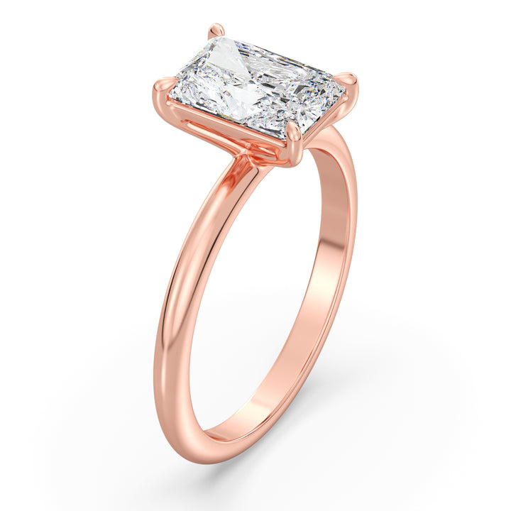 Radiant-cut lab-grown diamond solitaire engagement ring in 18K rose gold, showcasing a timeless 4-claw prong setting with a dazzling center diamond