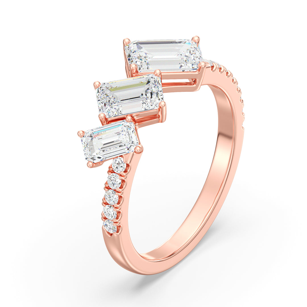 Triple Emerald-Cut Lab-Grown Diamond Wedding Ring in 18K Rose Gold with three emerald-cut diamonds and pavé-set round diamonds, exuding romantic sophistication.