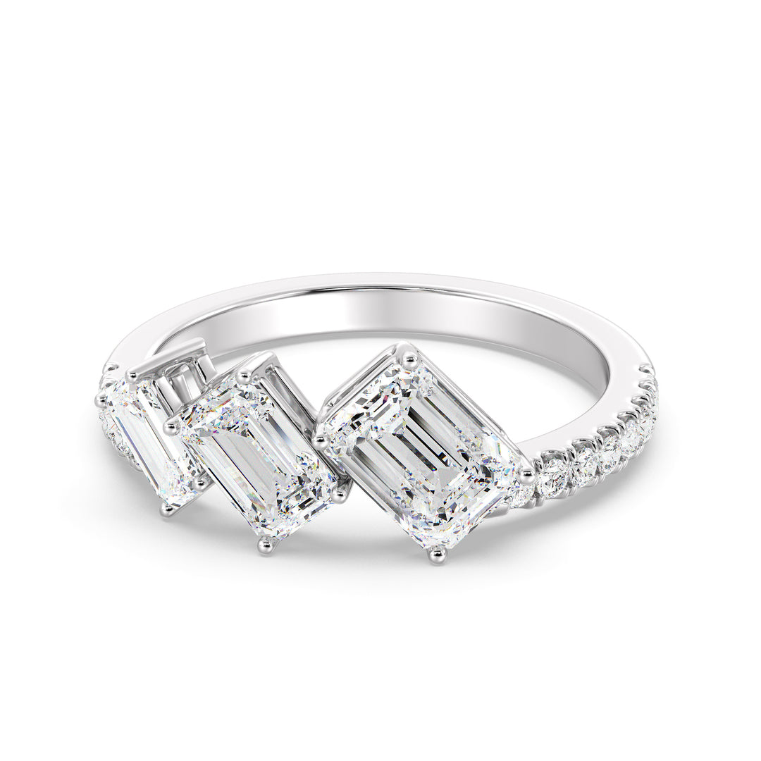 Triple Emerald-Cut Lab-Grown Diamond Wedding Ring in 18K White Gold showcasing three emerald-cut diamonds and pavé-set round diamonds for a sleek, modern look.