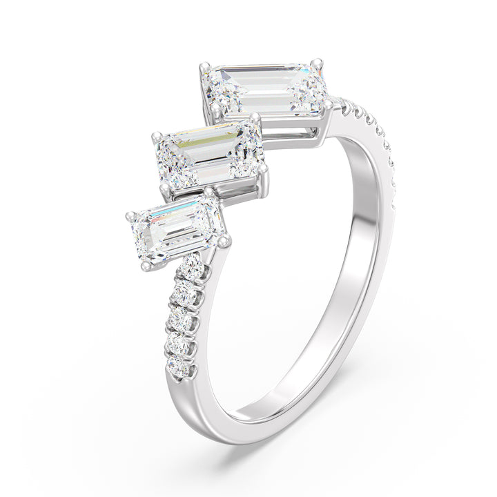 Triple Emerald-Cut Lab-Grown Diamond Wedding Ring in 18K White Gold showcasing three emerald-cut diamonds and pavé-set round diamonds for a sleek, modern look.