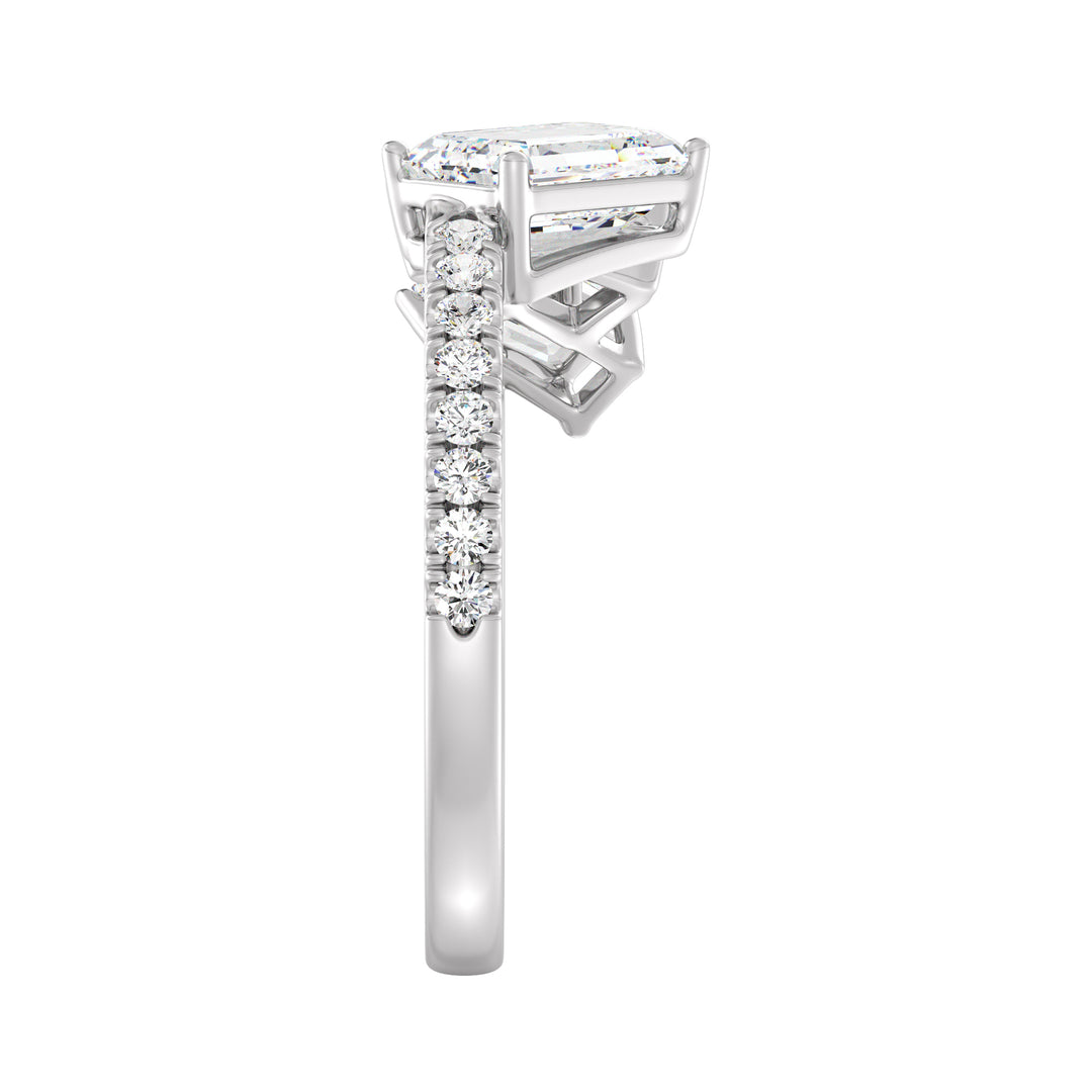 Triple Emerald-Cut Lab-Grown Diamond Wedding Ring in 18K White Gold showcasing three emerald-cut diamonds and pavé-set round diamonds for a sleek, modern look.