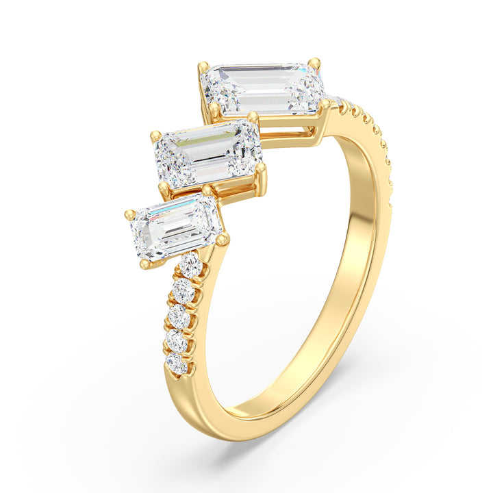 Triple Emerald-Cut Lab-Grown Diamond Wedding Ring in 18K Yellow Gold featuring three emerald-cut diamonds and pavé-set round diamonds for timeless elegance.