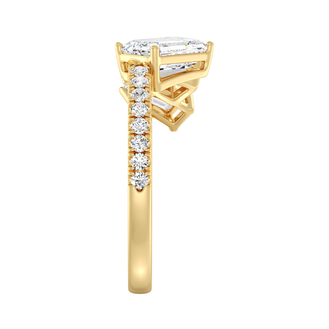 Triple Emerald-Cut Lab-Grown Diamond Wedding Ring in 18K Yellow Gold featuring three emerald-cut diamonds and pavé-set round diamonds for timeless elegance.