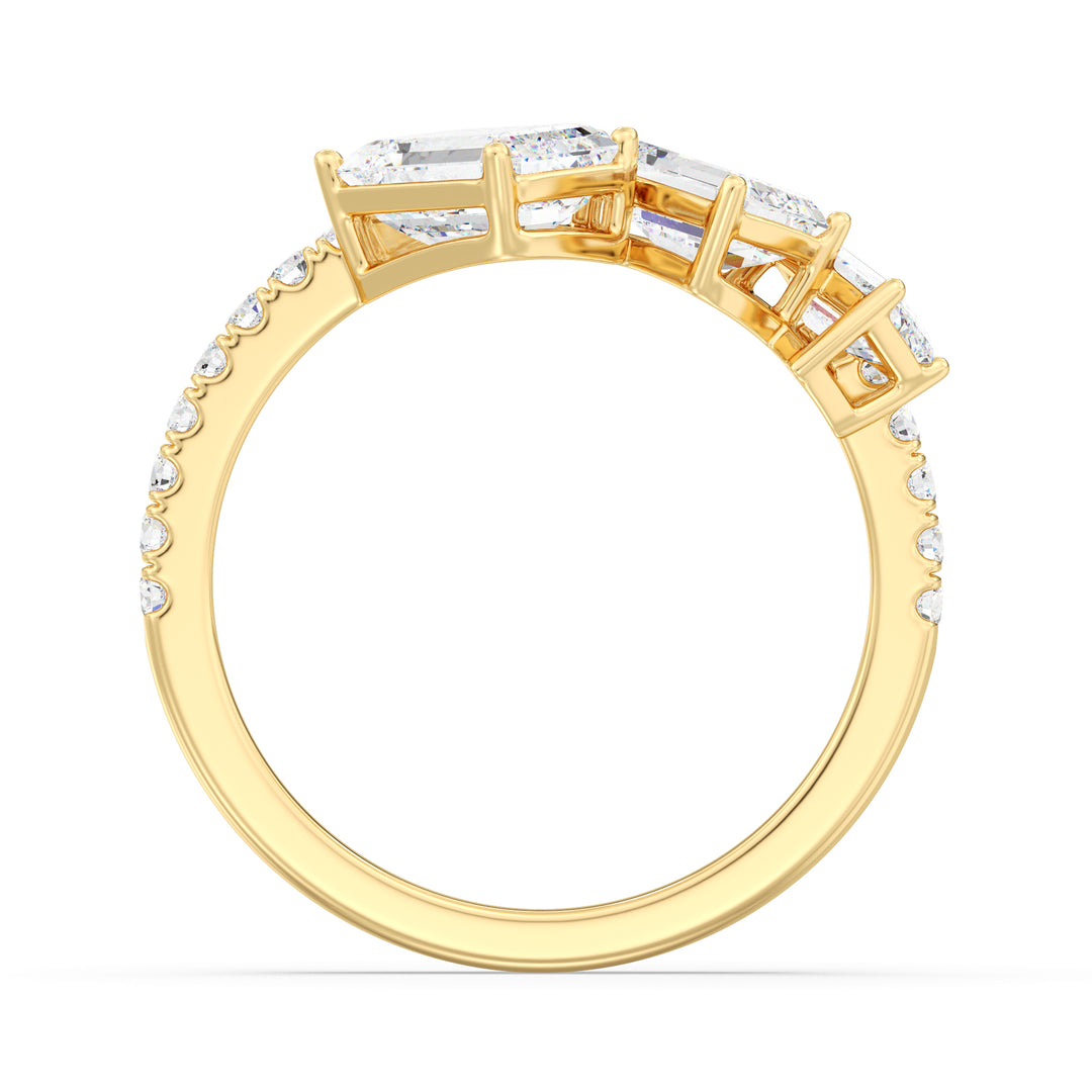 Triple Emerald-Cut Lab-Grown Diamond Wedding Ring in 18K Yellow Gold featuring three emerald-cut diamonds and pavé-set round diamonds for timeless elegance.