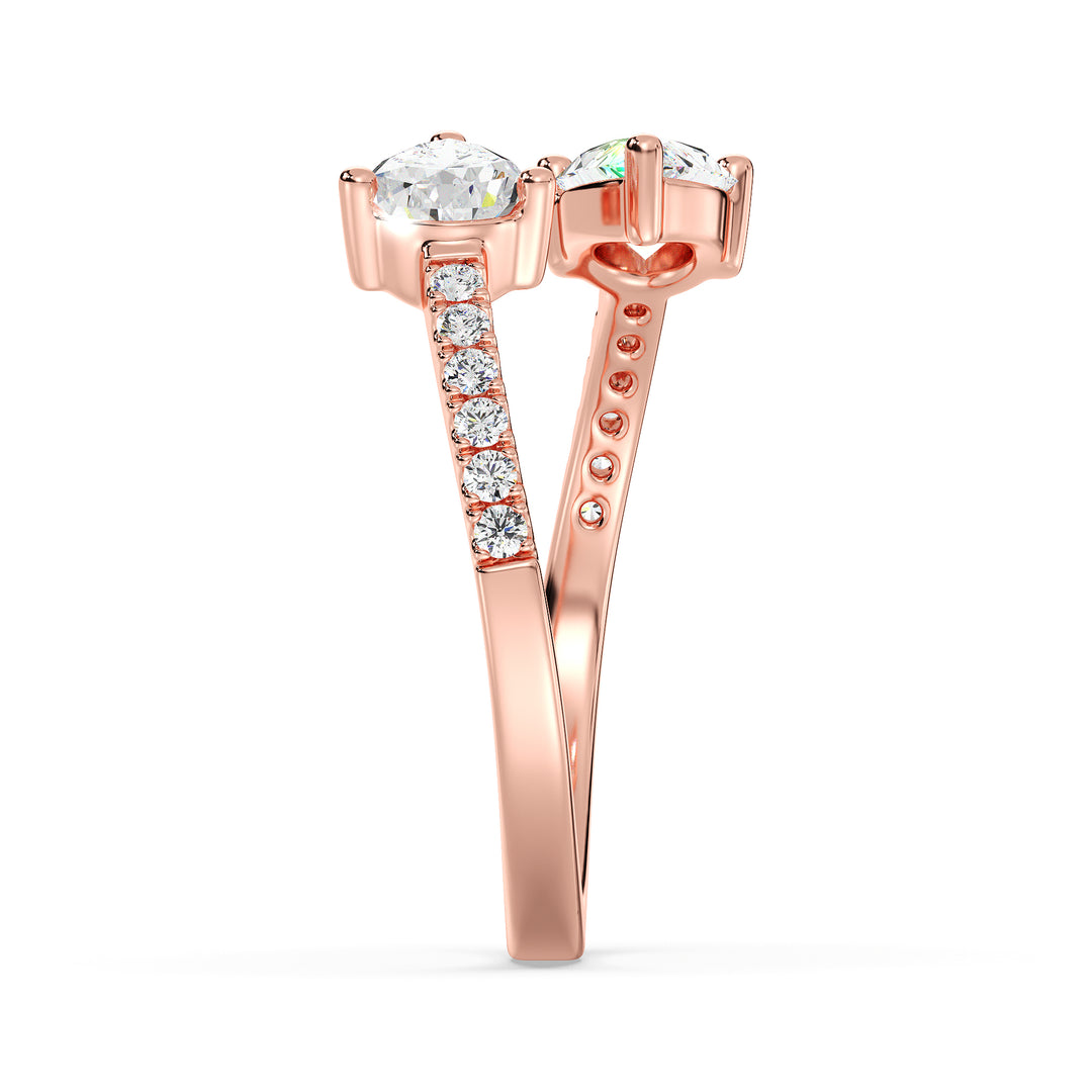 A stunning IGI Certified Pear-Shaped Lab-Grown Diamond Open Cuff Ring in 18K rose gold, showcasing two pear-cut diamonds and round brilliant-cut accent diamonds, blending elegance with modern charm.