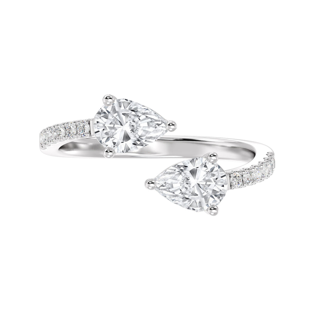 An elegant IGI Certified Pear-Shaped Lab-Grown Diamond Open Cuff Ring in 18K white gold, adorned with two pear-cut diamonds and round brilliant-cut accent diamonds, exuding timeless sophistication and brilliance.