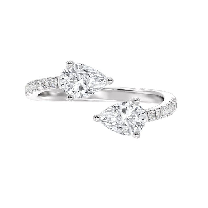 An elegant IGI Certified Pear-Shaped Lab-Grown Diamond Open Cuff Ring in 18K white gold, adorned with two pear-cut diamonds and round brilliant-cut accent diamonds, exuding timeless sophistication and brilliance.