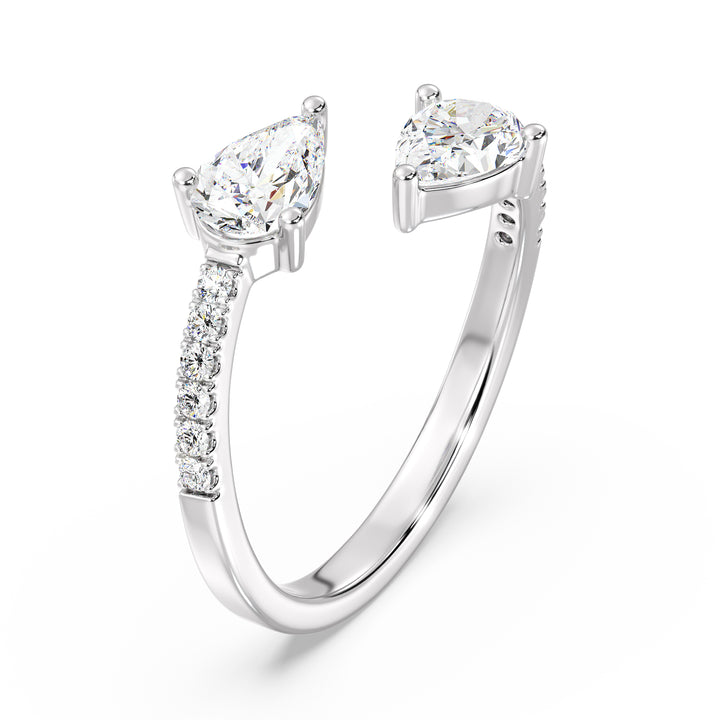 An elegant IGI Certified Pear-Shaped Lab-Grown Diamond Open Cuff Ring in 18K white gold, adorned with two pear-cut diamonds and round brilliant-cut accent diamonds, exuding timeless sophistication and brilliance.
