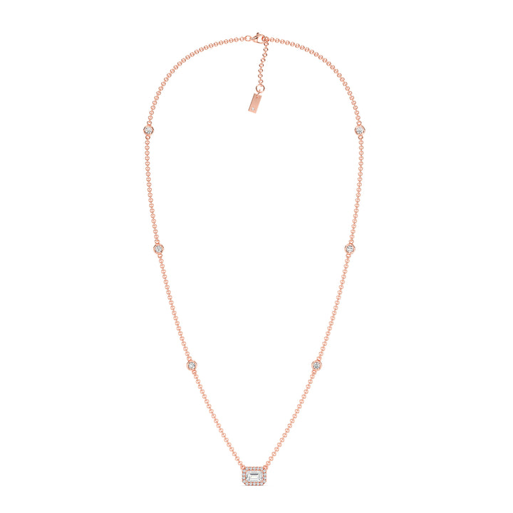 Elegant Emerald-Cut Lab-Grown Diamond Station Necklace in 18K Rose Gold showcasing a bezel-set 1.00-carat emerald-cut diamond with halo and stationed round diamonds for added brilliance.