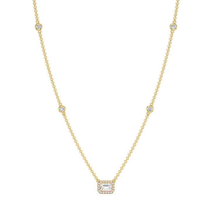Elegant Emerald-Cut Lab-Grown Diamond Station Necklace in 18K Yellow Gold featuring a bezel-set 1.00-carat emerald-cut diamond with halo and stationed round diamonds along the chain.