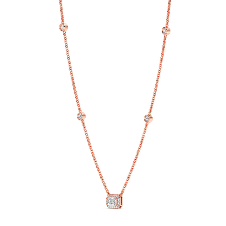 Elegant Emerald-Cut Lab-Grown Diamond Station Necklace in 18K Rose Gold showcasing a bezel-set 1.00-carat emerald-cut diamond with halo and stationed round diamonds for added brilliance.