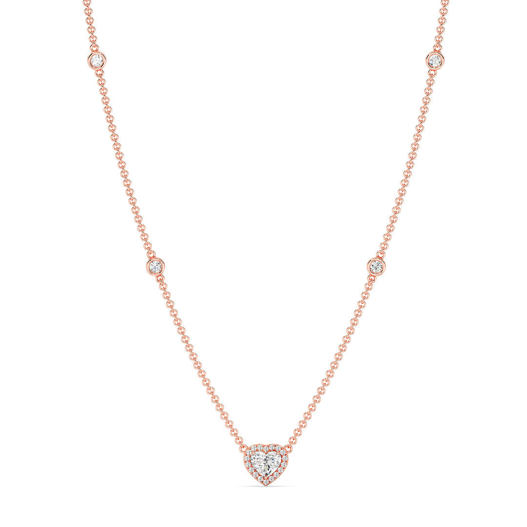 Elegant Heart Diamond Accent Halo & Bezel Station Necklace in 18K Rose Gold showcasing a 1.00ct heart-cut lab-grown diamond framed by a halo of EF/VS diamonds with a diamond-accented chain