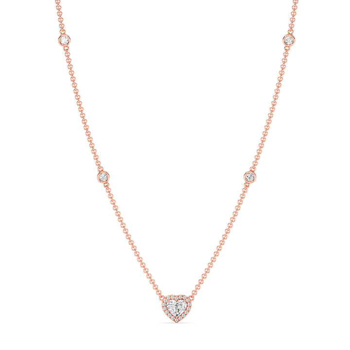 Elegant Heart Diamond Accent Halo & Bezel Station Necklace in 18K Rose Gold showcasing a 1.00ct heart-cut lab-grown diamond framed by a halo of EF/VS diamonds with a diamond-accented chain