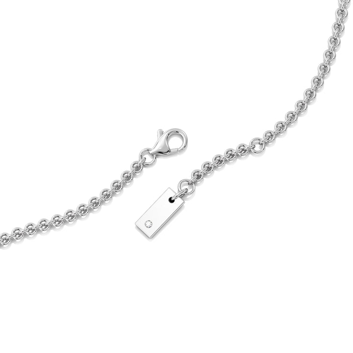 Elegant Heart Diamond Accent Halo & Bezel Station Necklace in 18K White Gold with a central 1.00ct heart-cut lab-grown diamond surrounded by a halo of smaller EF/VS diamonds and a bezel-set diamond-accented chain.