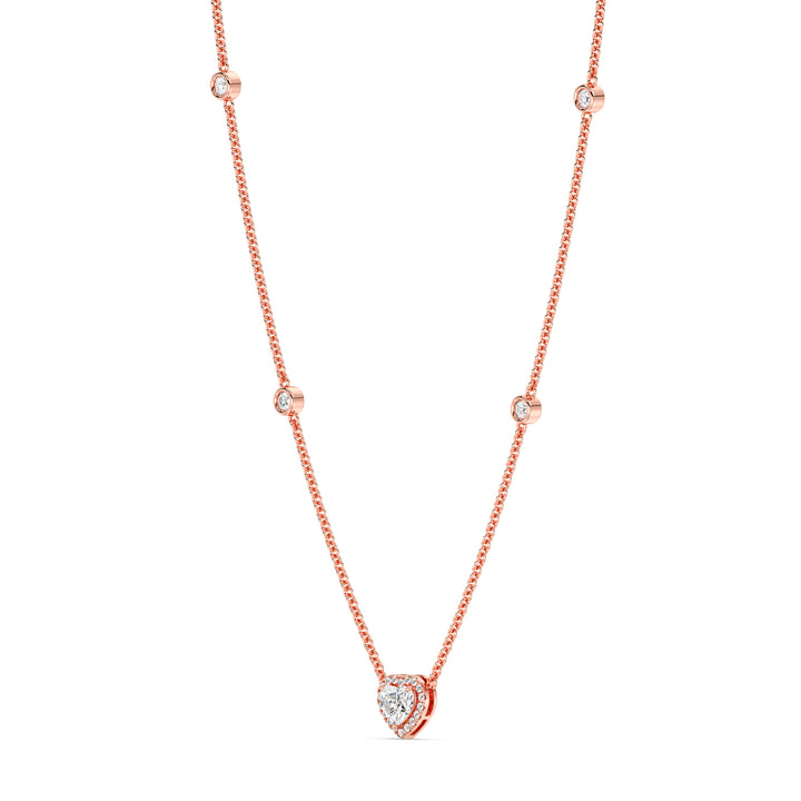 Elegant Heart Diamond Accent Halo & Bezel Station Necklace in 18K Rose Gold showcasing a 1.00ct heart-cut lab-grown diamond framed by a halo of EF/VS diamonds with a diamond-accented chain