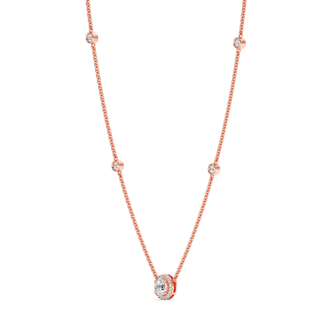 18K rose gold Round Diamond Accent Halo Bezel Station Necklace with a 1.00ct IGI Certified lab-grown diamond at the center, surrounded by EF/VS halo diamonds and bezel-set diamonds along the chain