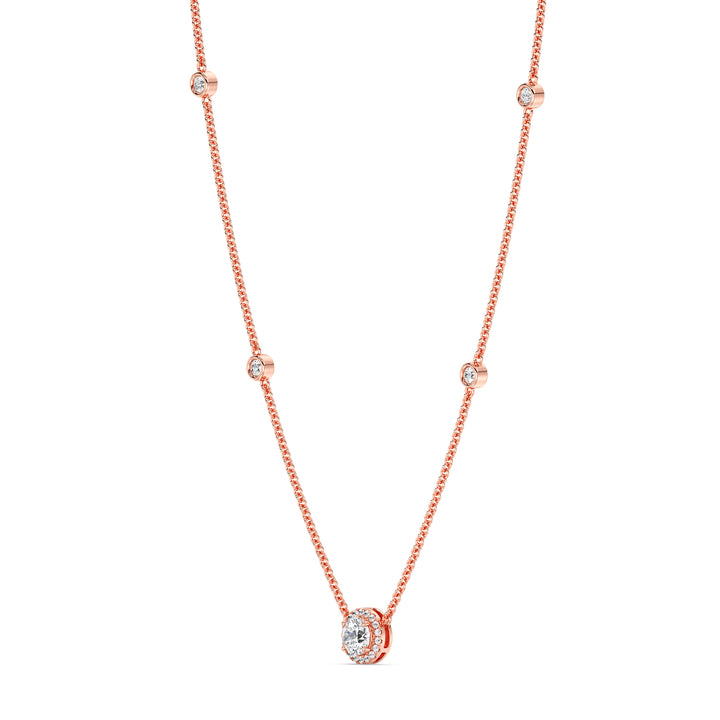 18K rose gold Round Diamond Accent Halo Bezel Station Necklace with a 1.00ct IGI Certified lab-grown diamond at the center, surrounded by EF/VS halo diamonds and bezel-set diamonds along the chain