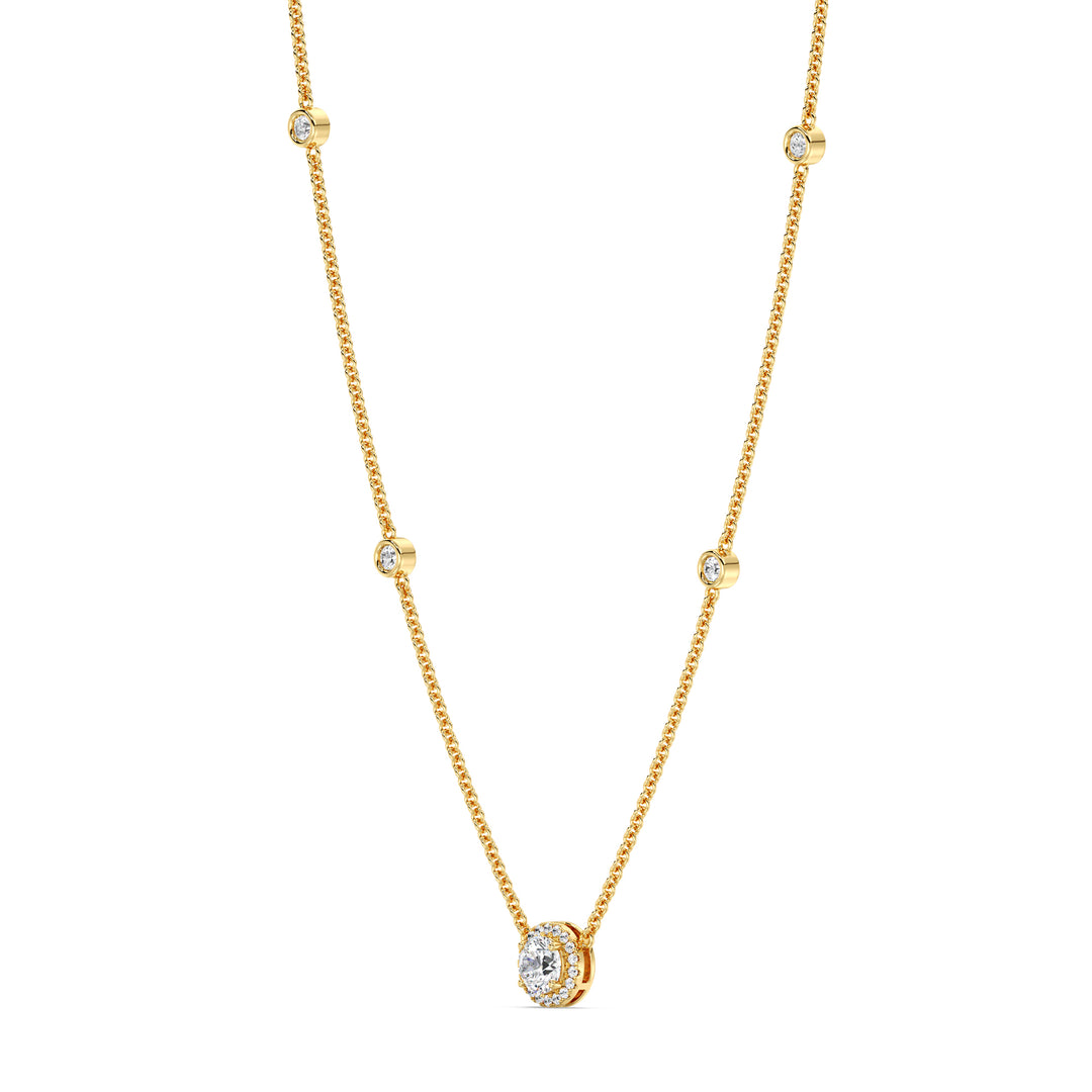 18K yellow gold Round Diamond Accent Halo Bezel Station Necklace featuring a 1.00ct IGI Certified lab-grown diamond at the center with a halo of smaller EF/VS diamonds and additional bezel-set diamonds on the chain