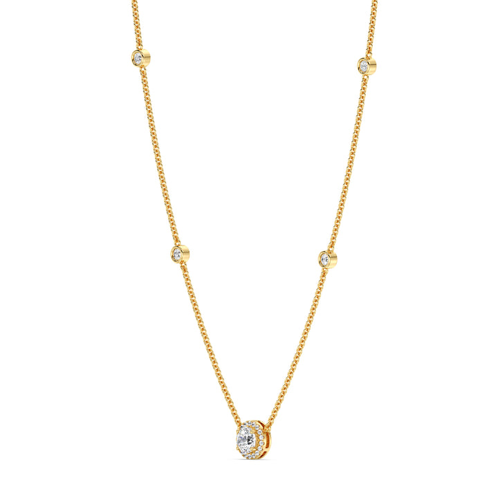 18K yellow gold Round Diamond Accent Halo Bezel Station Necklace featuring a 1.00ct IGI Certified lab-grown diamond at the center with a halo of smaller EF/VS diamonds and additional bezel-set diamonds on the chain