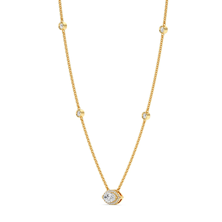 Elegant Marquise Diamond Accent Bezel Station Necklace in 18K Yellow Gold featuring a 1.00ct IGI Certified marquise-cut lab-grown diamond at the center, surrounded by round EF/VS lab-grown diamonds along an 18-inch chain