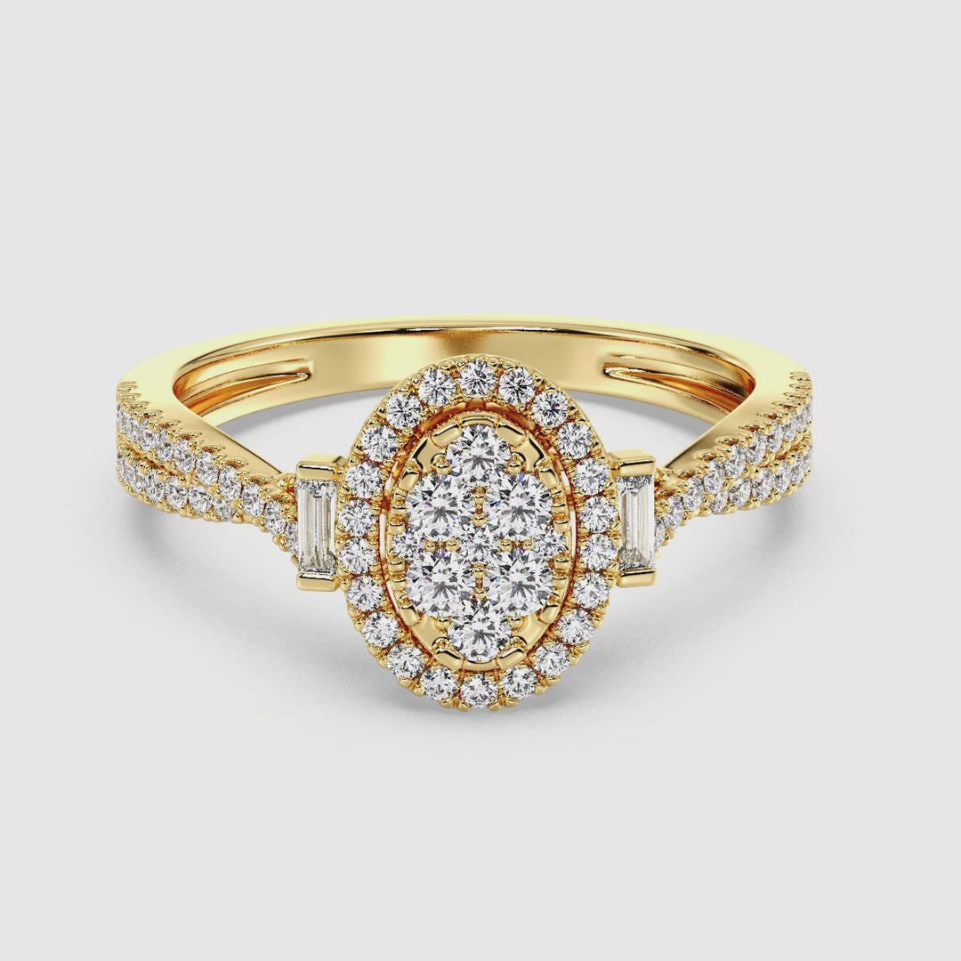 Close-up video showcasing the 18K Yellow Gold Oval Cluster Halo Engagement Ring with 0.67 CTW lab-grown diamonds. The ring features a dazzling oval cluster halo design with round and baguette diamonds, set in vibrant yellow gold. The video highlights the brilliance of the EF color diamonds and the elegant craftsmanship, making it a timeless and sustainable choice for an engagement ring.