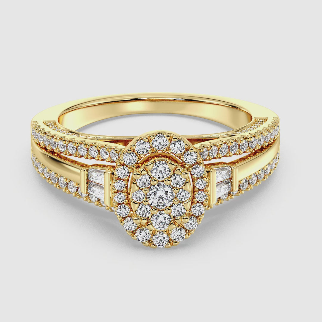Video showcasing a 1.29CTTW Oval Halo Split Shank Engagement Ring in 18K Yellow Gold, featuring 143 EF-VS lab-grown diamonds in oval, round, and tapered baguette cuts. The ring sparkles as it rotates, highlighting the intricate split shank design, radiant halo setting, and warm yellow gold tone.