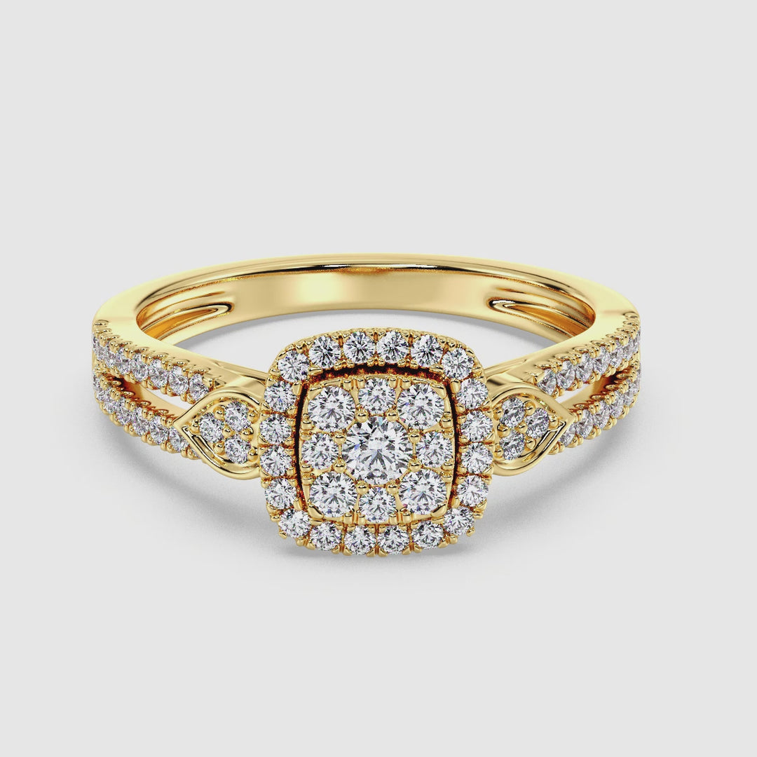 video showcasing an 18K yellow gold double halo square engagement ring. The ring features a brilliant square setting adorned with 67 round lab-grown diamonds totaling 0.6 carats, with exceptional EF color and VS clarity. The warm yellow gold band beautifully complements the sparkle of the diamonds, creating a timeless and elegant look. The video highlights the intricate craftsmanship, showcasing the ring from various angles to emphasize its stunning design and luxurious details. Perfect for a memorable prop