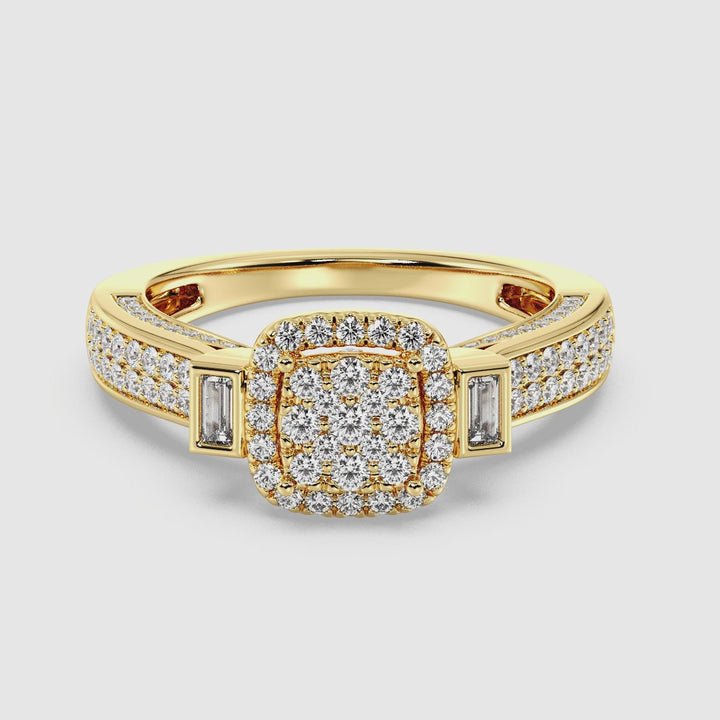 Video showcasing a 0.84 CTTW Round and Baguette EF-VS Lab-Grown Diamond Square Cluster Halo Engagement Ring in 18K Yellow Gold. The video highlights the intricate diamond arrangement with a harmonious blend of round and baguette cuts, set on a luxurious yellow gold band. The piece sparkles brilliantly as it rotates, revealing its timeless elegance and fine craftsmanship