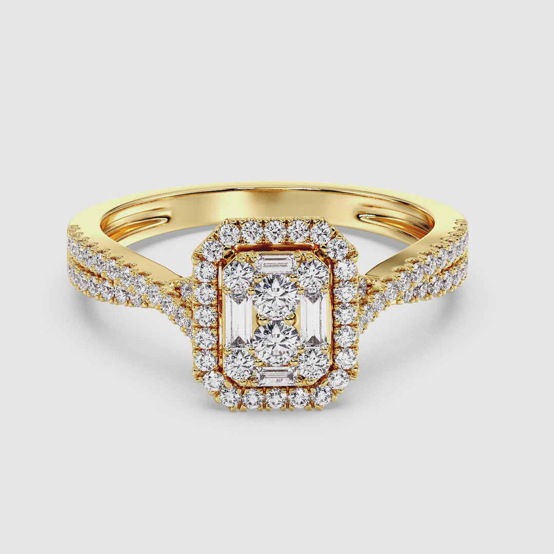 Video showcasing a stunning 0.67 CTW Round & Baguette EF-VS Lab-Grown Diamond Emerald Cluster Halo Engagement Ring in Yellow 18K Gold. The close-up highlights the radiant sparkle of 76 round and baguette-cut diamonds, set in a luxurious yellow gold band with intricate craftsmanship, capturing the timeless elegance of this exquisite bridal piece.