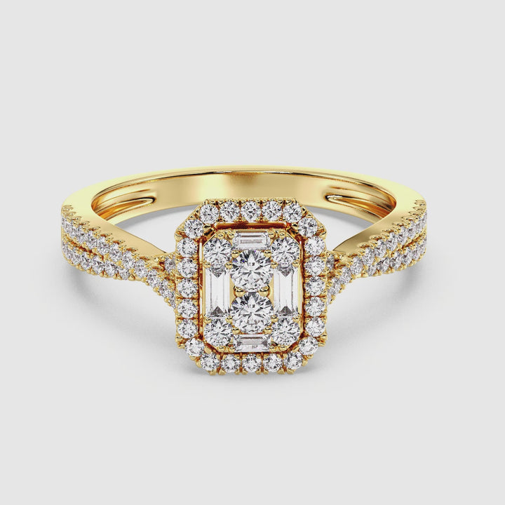 Video showcasing a stunning 0.67 CTW Round & Baguette EF-VS Lab-Grown Diamond Emerald Cluster Halo Engagement Ring in Yellow 18K Gold. The close-up highlights the radiant sparkle of 76 round and baguette-cut diamonds, set in a luxurious yellow gold band with intricate craftsmanship, capturing the timeless elegance of this exquisite bridal piece.