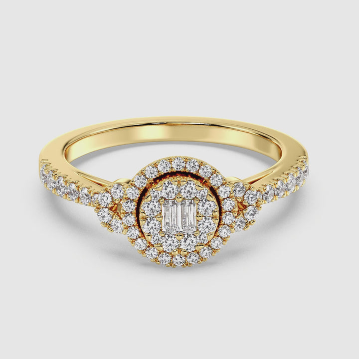 Video showcasing a stunning Round Cluster Halo Engagement Ring in yellow gold, featuring 0.54 CTTW lab-grown diamonds. The close-up view highlights the intricate round and baguette diamond arrangement, radiant sparkle, and luxurious 18K yellow gold setting. Perfect for timeless elegance and sophistication
